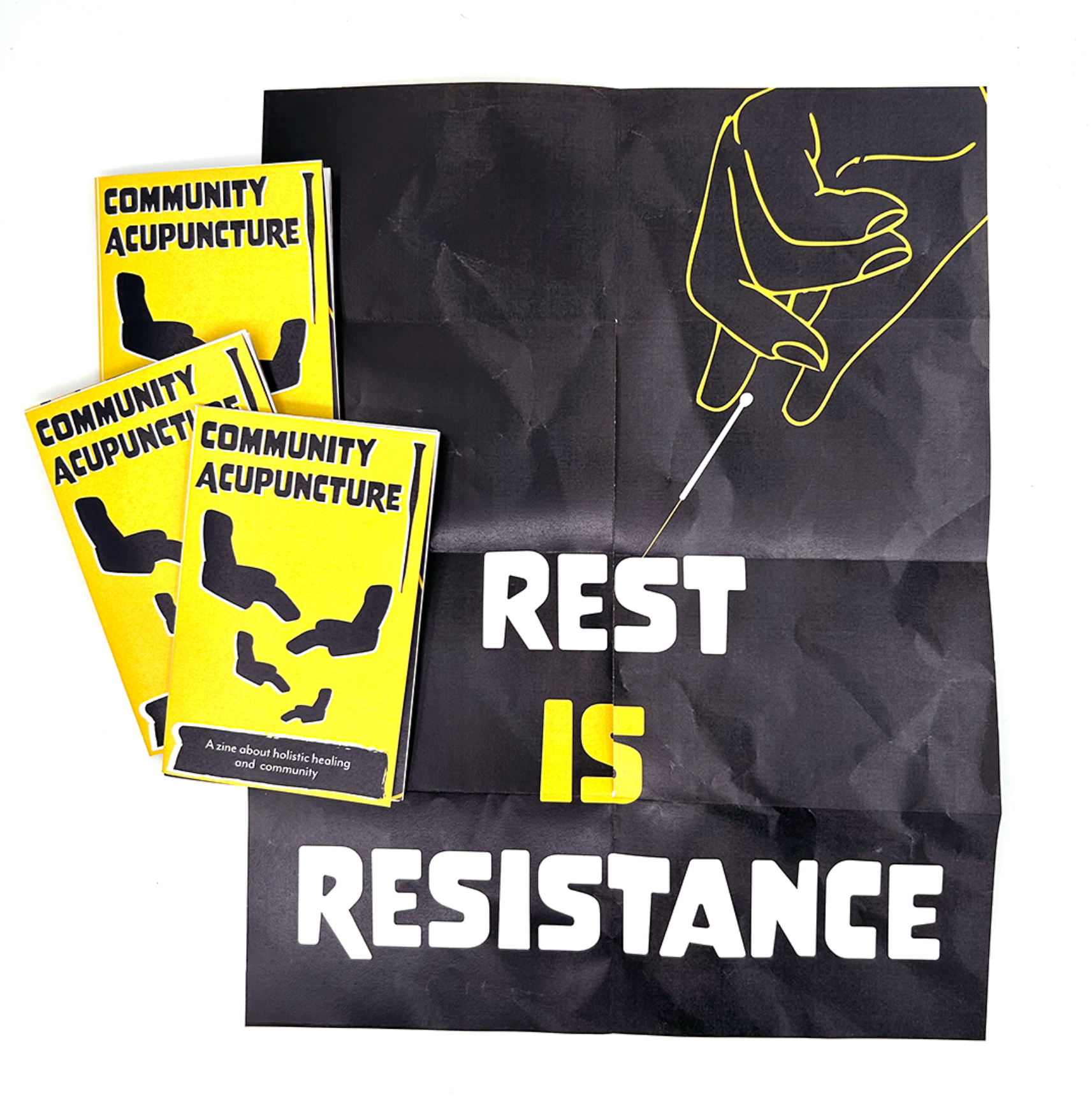 a zine explaining community accupuncture with a large black image that reads, &amp;amp;quot;Rest is resistance&amp;amp;quot; and features an accupuncture needle.