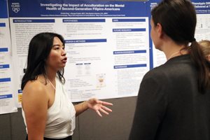 2024 HERE student Kristel Ong presents at the Illinois poster session and celebration